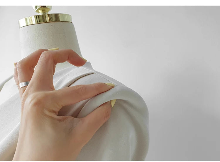 Robe Portefeuille Blanche chez robeportefeuille.com